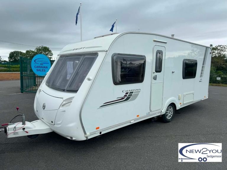 2010 Swift Charisma 550 4 Berth FIXED BED Caravan - STOCK NO J032