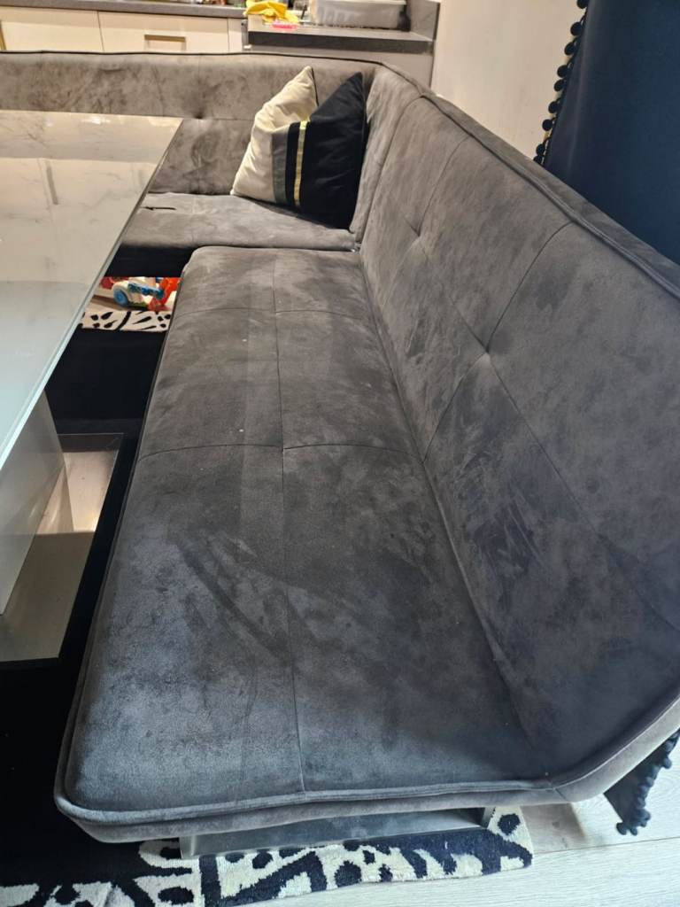 Table with corner chair, sofa and bench