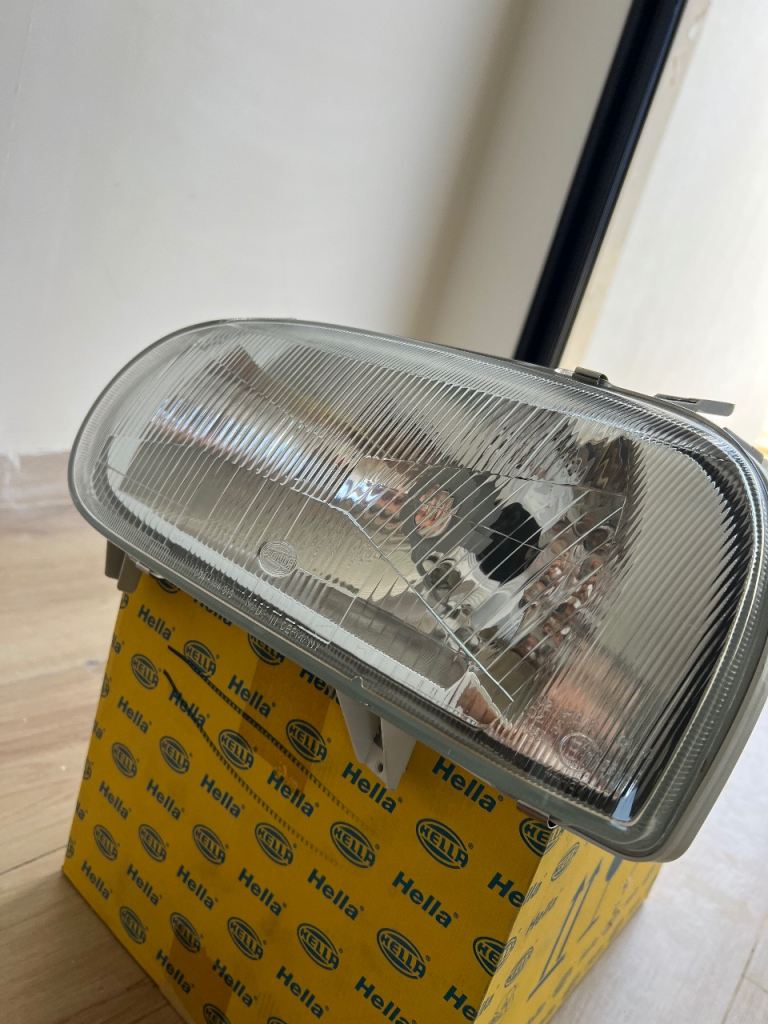 Hella Headlight LEFT VW Passat B3 NOS NEW Original 1AJ 007 235-231