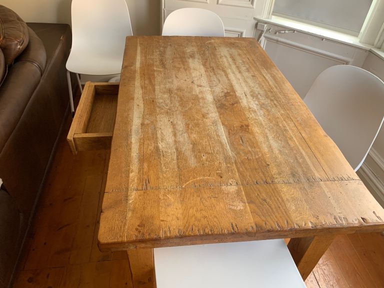 Solid oak distressed wood dining table with extensions