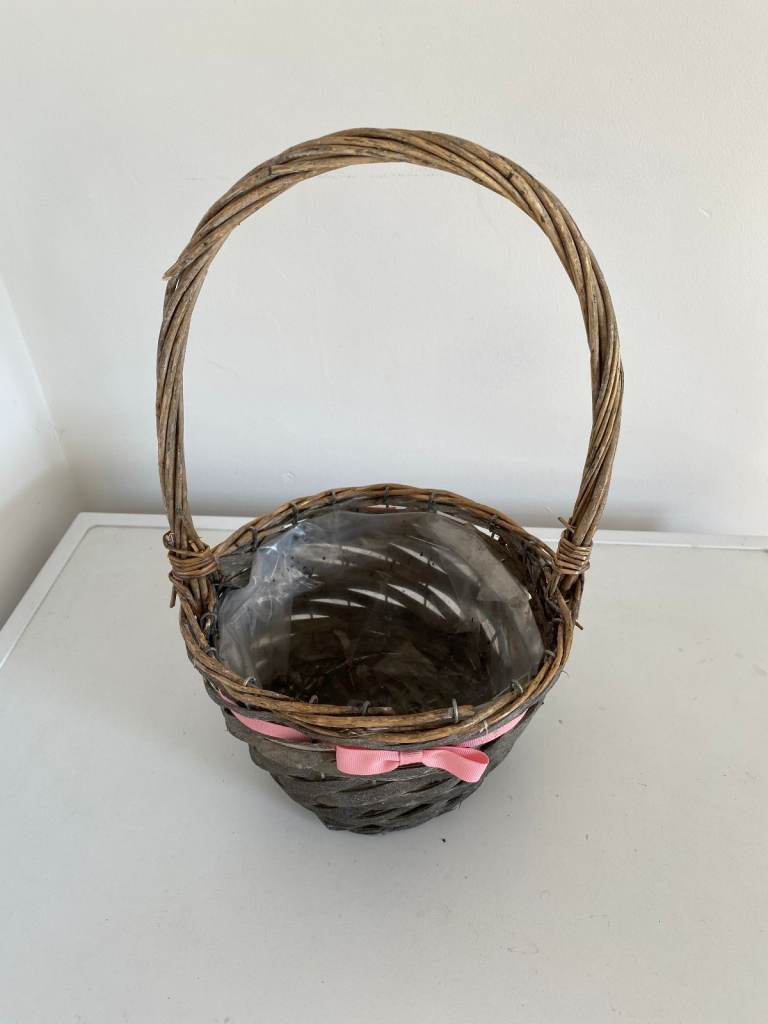 BASKET WITH TALL HANDLE and PINK BOW