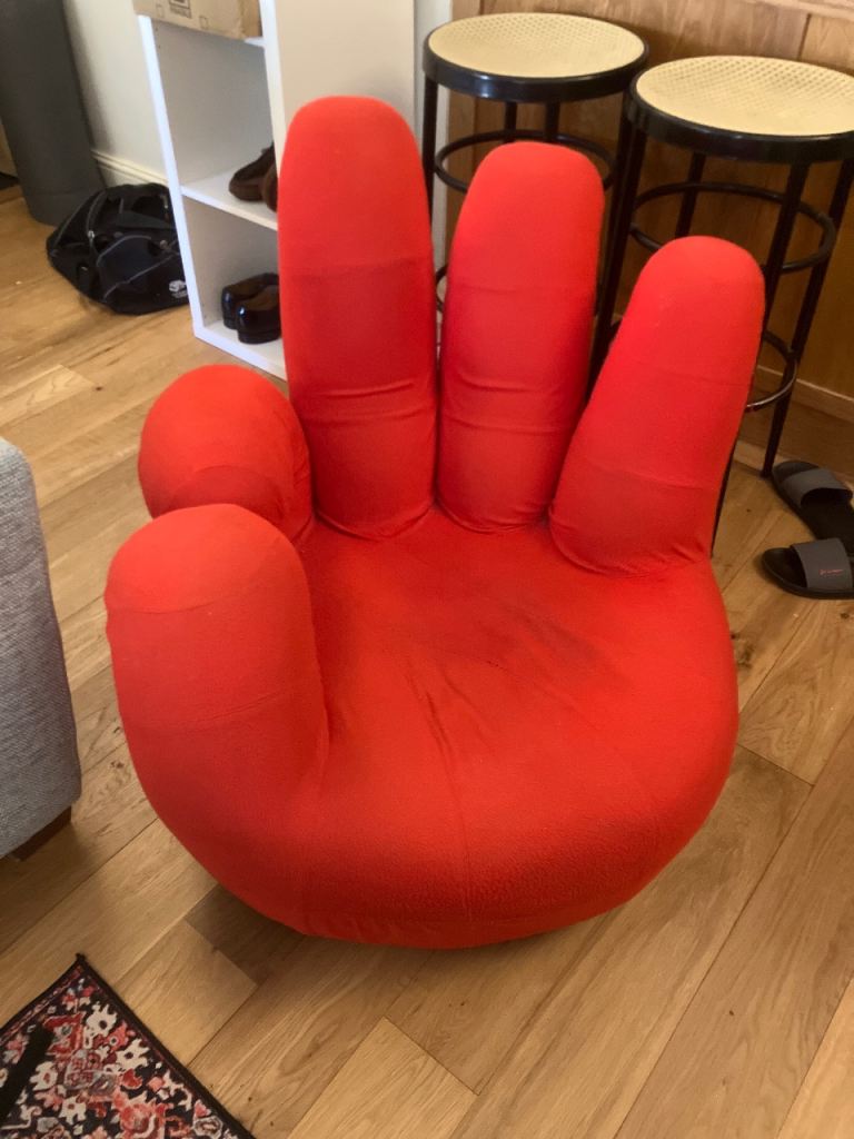 Red hand swivel chair