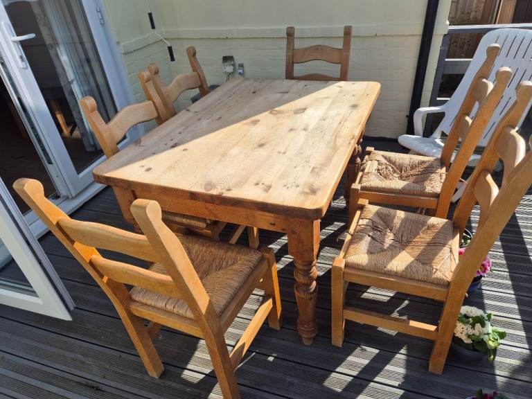 Solid wood Farmhouse style table and (6) chairs. 