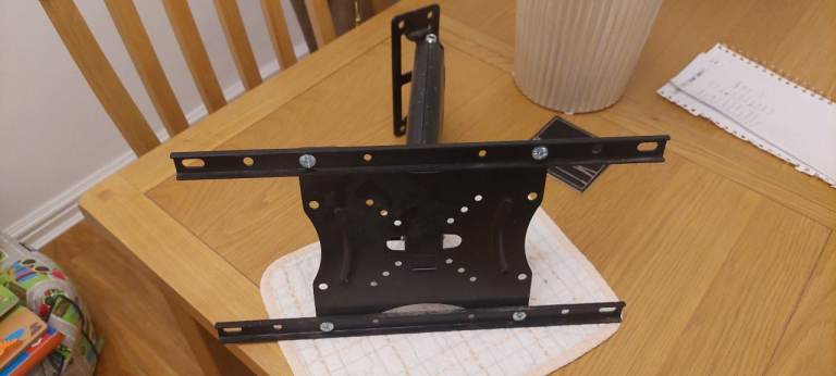Tv, wall mounting bracket