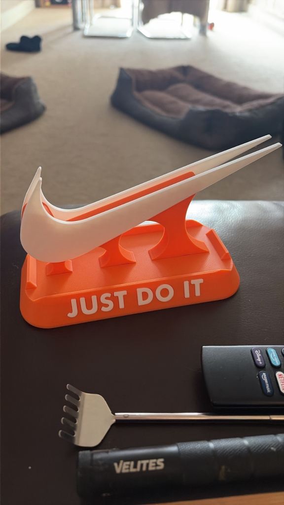 Nike 'Just Do It' phone holder – Orange & White