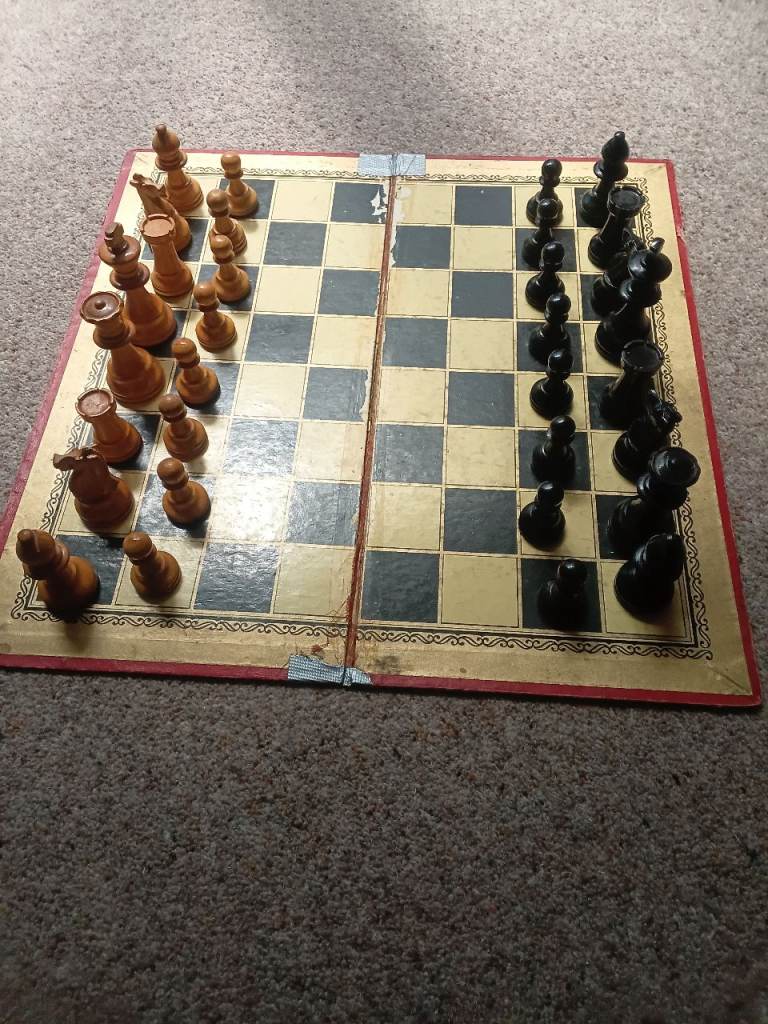 Retro wooden chess set and board plus bacelite draughts set