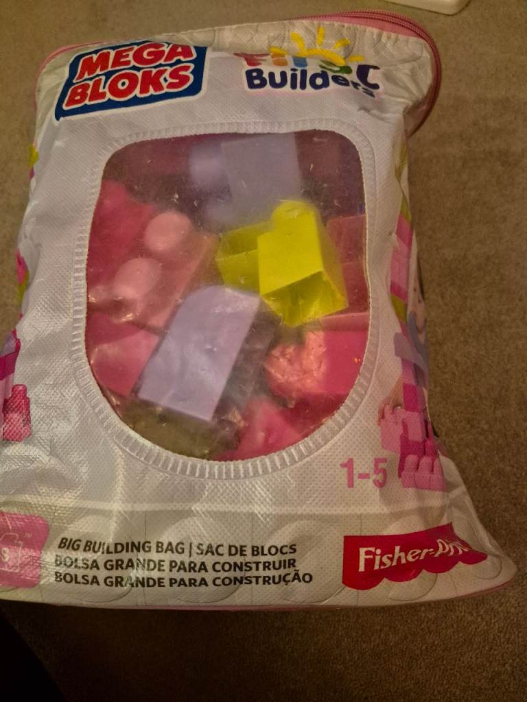 Bundle of toys and dressing gown.