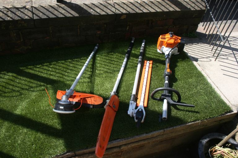 STIHL KM94 Combi set with HL145 Hedge Trimmer attachment, pruning saw, strimmer \ brushcutter