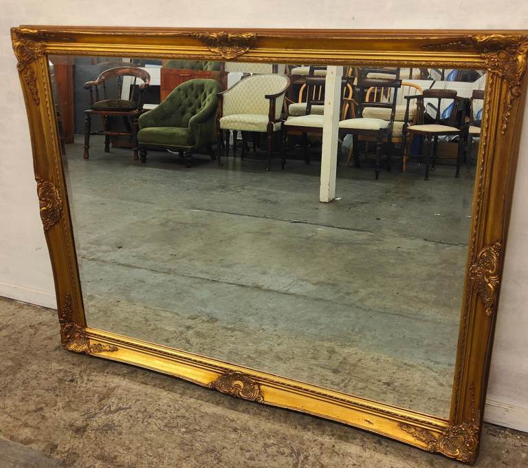 image for A large Victorian style gilt mirror.