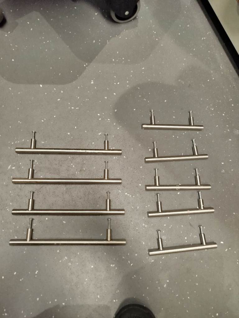 9 X cabinet handles brushed steel, length 23cm & 15cm  perfect condition, set 9