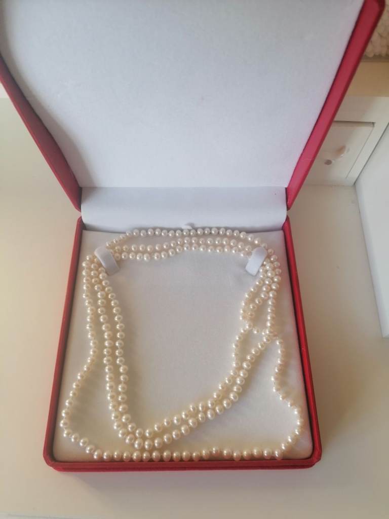 A Brand new Genuine Cultured Freshwater Pearl long necklace