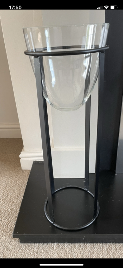Tall vase with metal stand