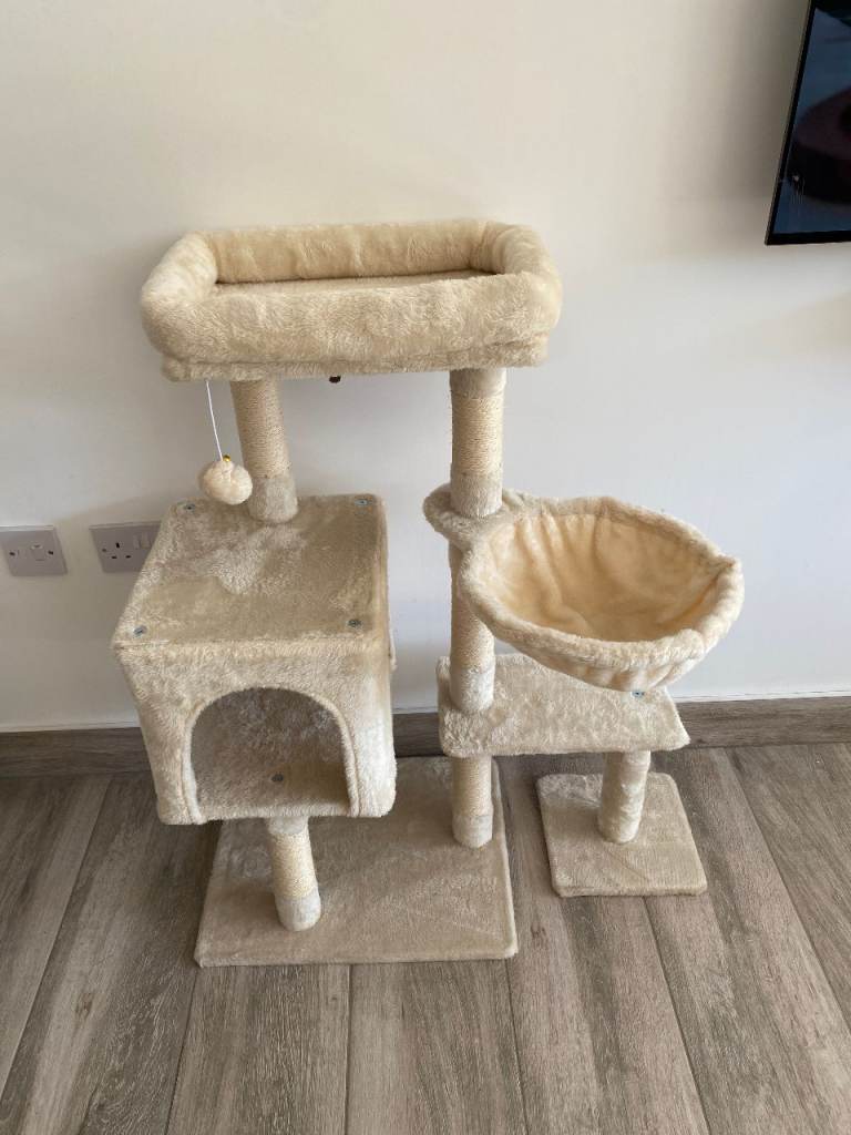 Cream Cat Tree with Multiple Levels and Scratching Posts