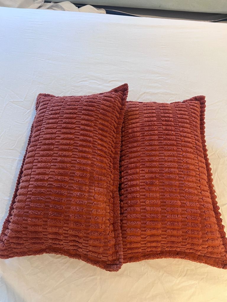 Pair of Soft Orange Cushions – Good Condition