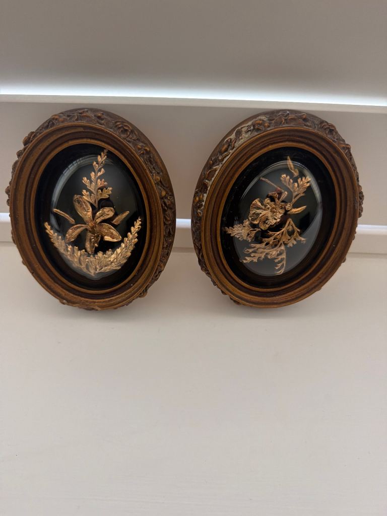 Pair of Vintage Oval Framed Wall Art with Gold Floral Relief