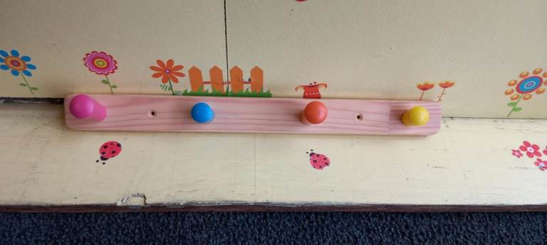 Ikea Flisat knob rack with 4 colourful knobs