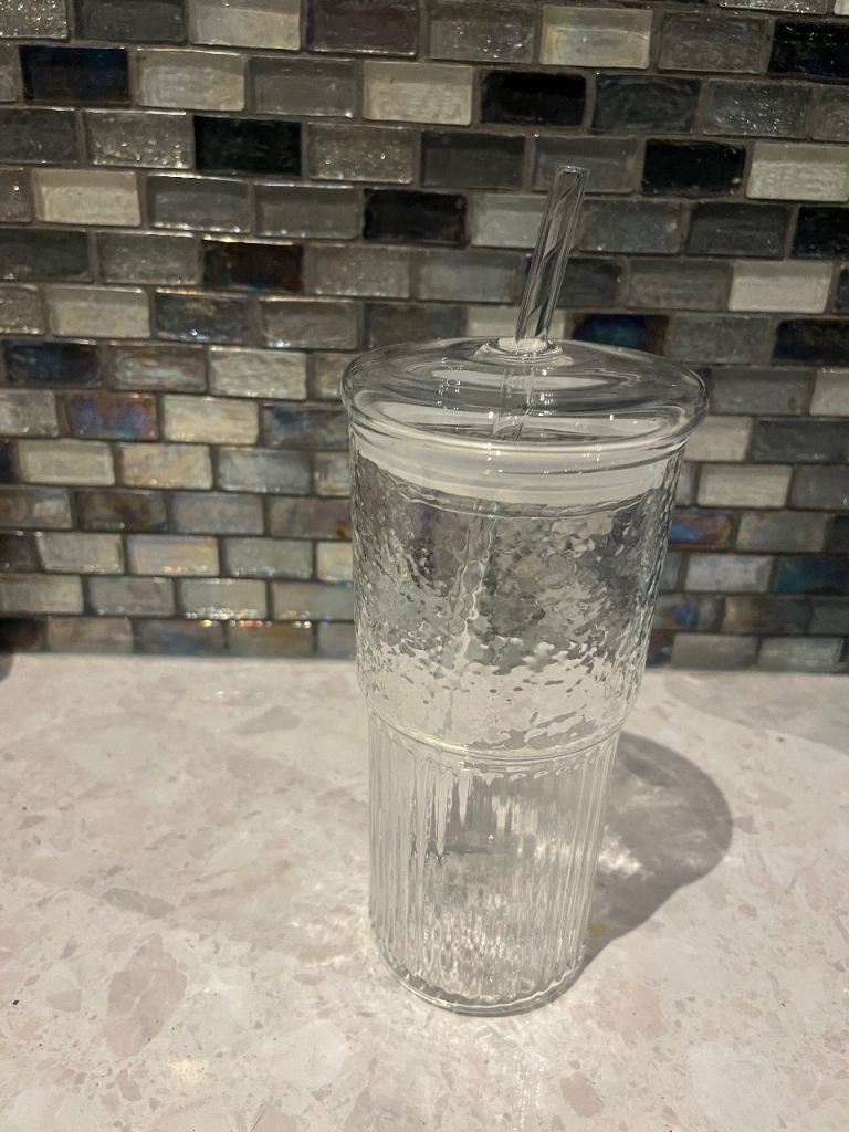 Set of 2 iced coffee glasses with lids and straws. 19cm high