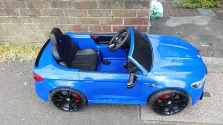 Kids self driving BMW blue 