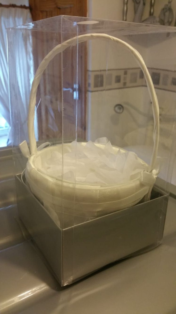 Small white flower girl basket with white artificial petals