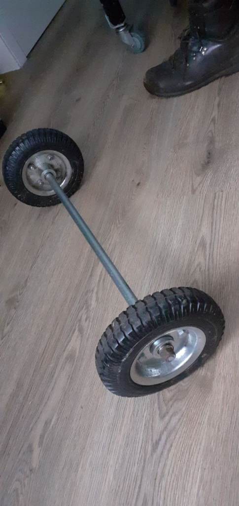 Trailer axle with wheels bogey trolley 