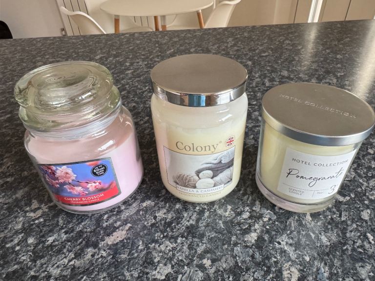 image for Three large assorted candles £8 lot