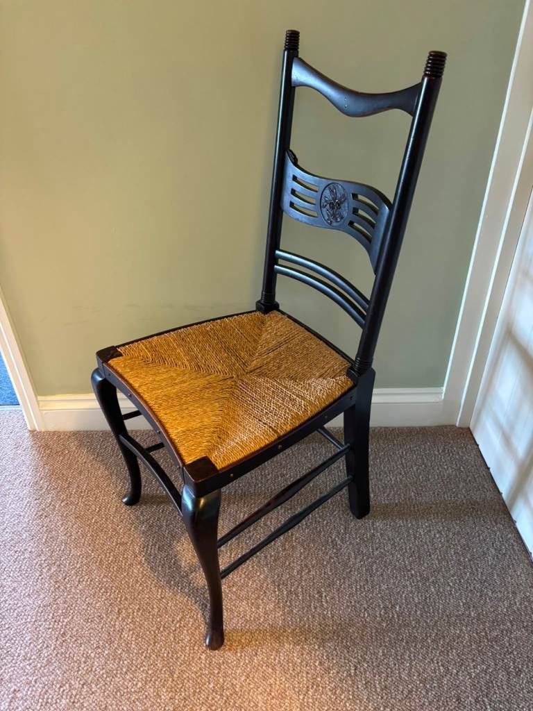 Black Wooden Chair with Woven Seat – Good Condition