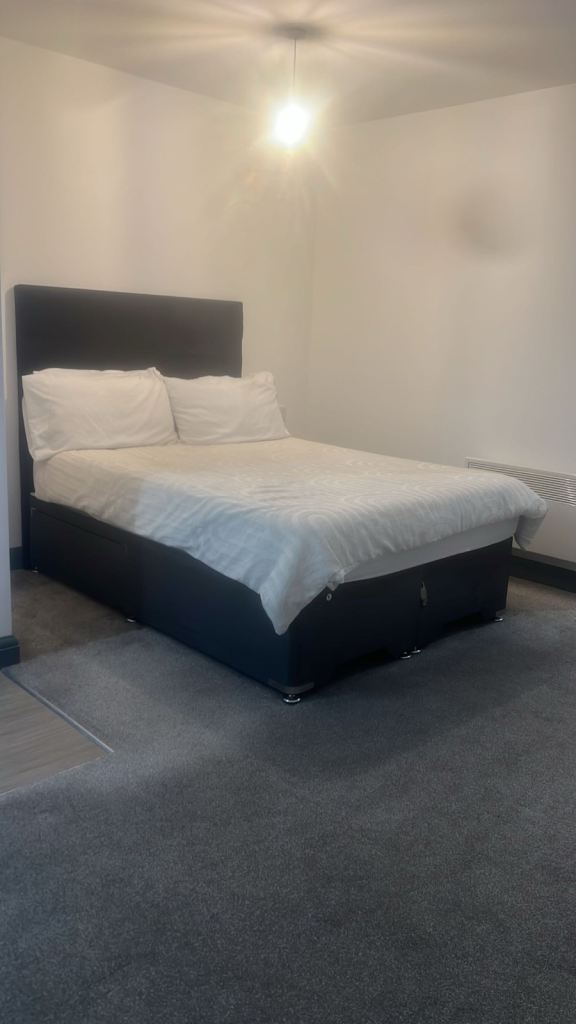 Double bed, as good as new, without mattress. 
