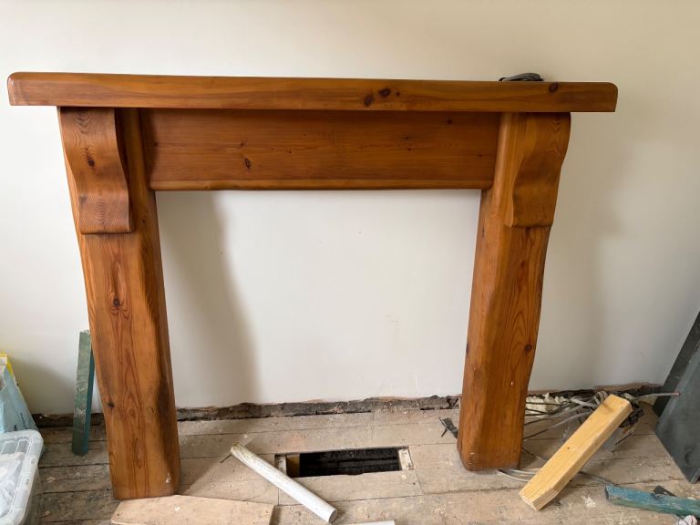 Chunky wooden fire surround with a hearth to go with it 
