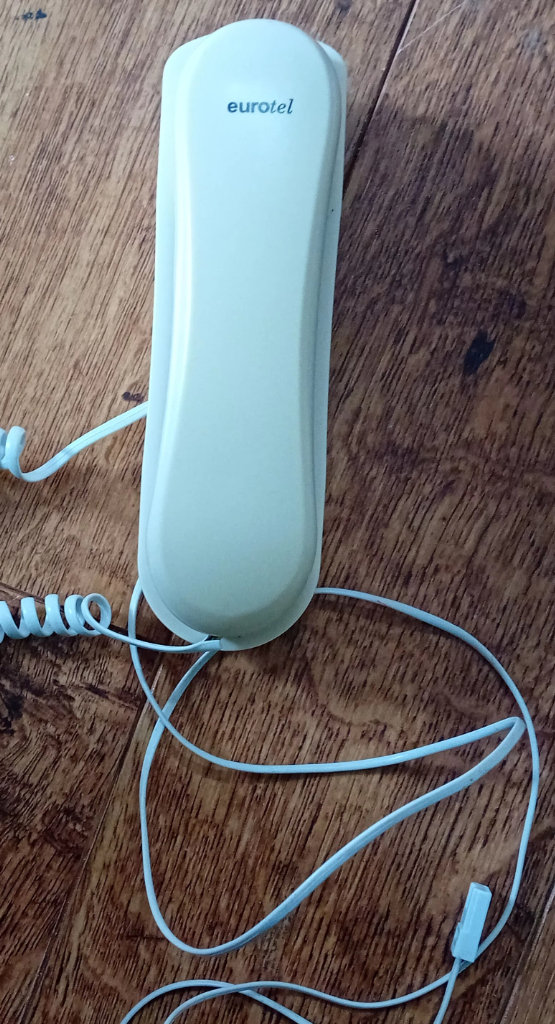 Cradle style telephone