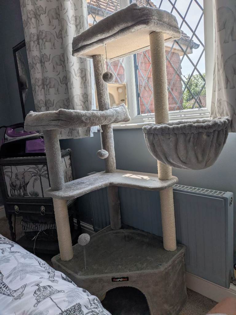 Tall grey cat tower