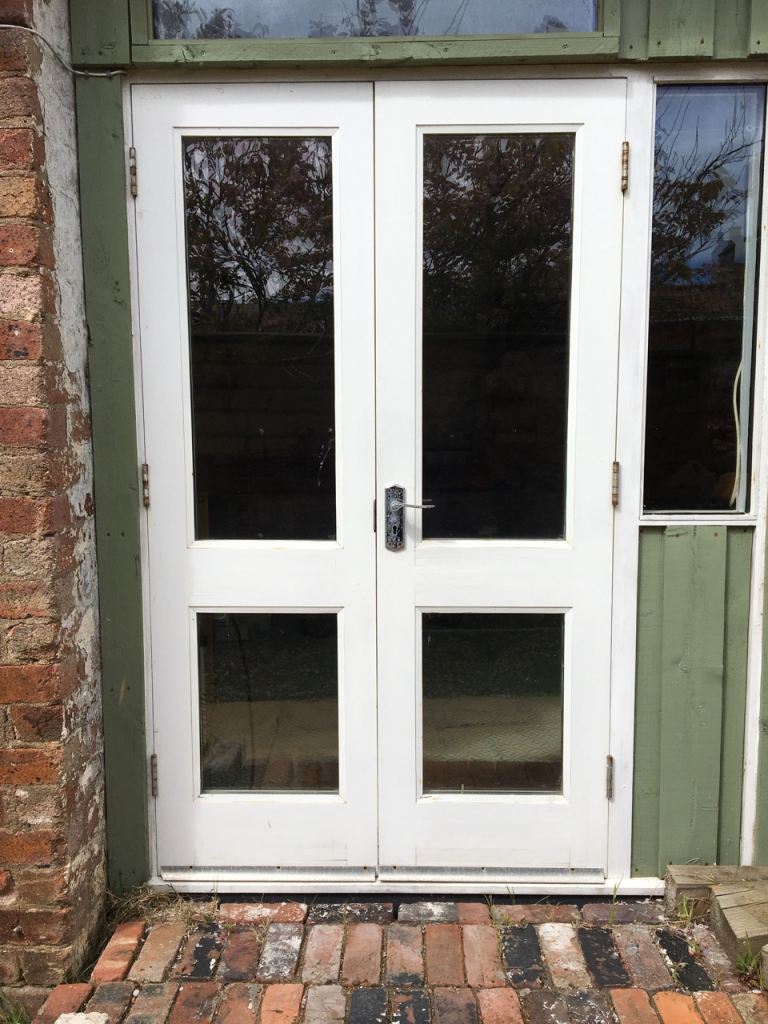 Patio doors double glazed solid wood new & unused two sets available