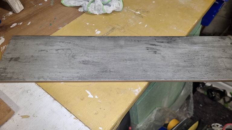 5 x boxes grey tiles.