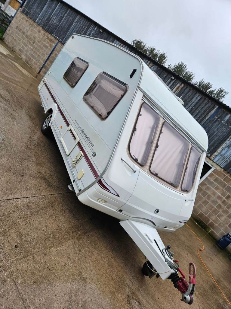 Cheap 4 berth caravan, no damp, accessories included 