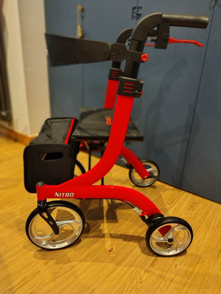 Drive Medical Nitro 4 wheeled Rollator with seat.