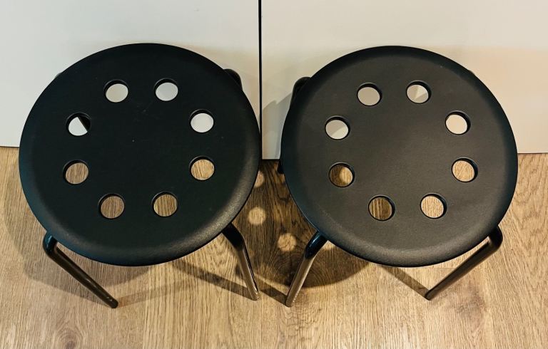2 black dining stools
