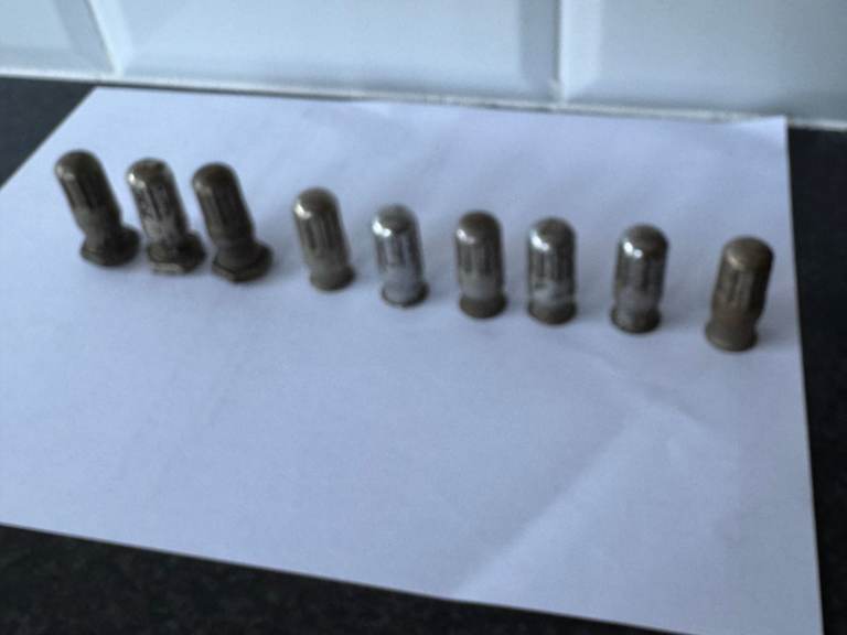 old pre war car tyre  valve caps