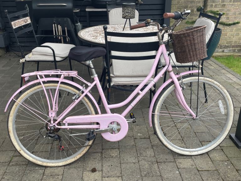 Ladies pink bike with basket