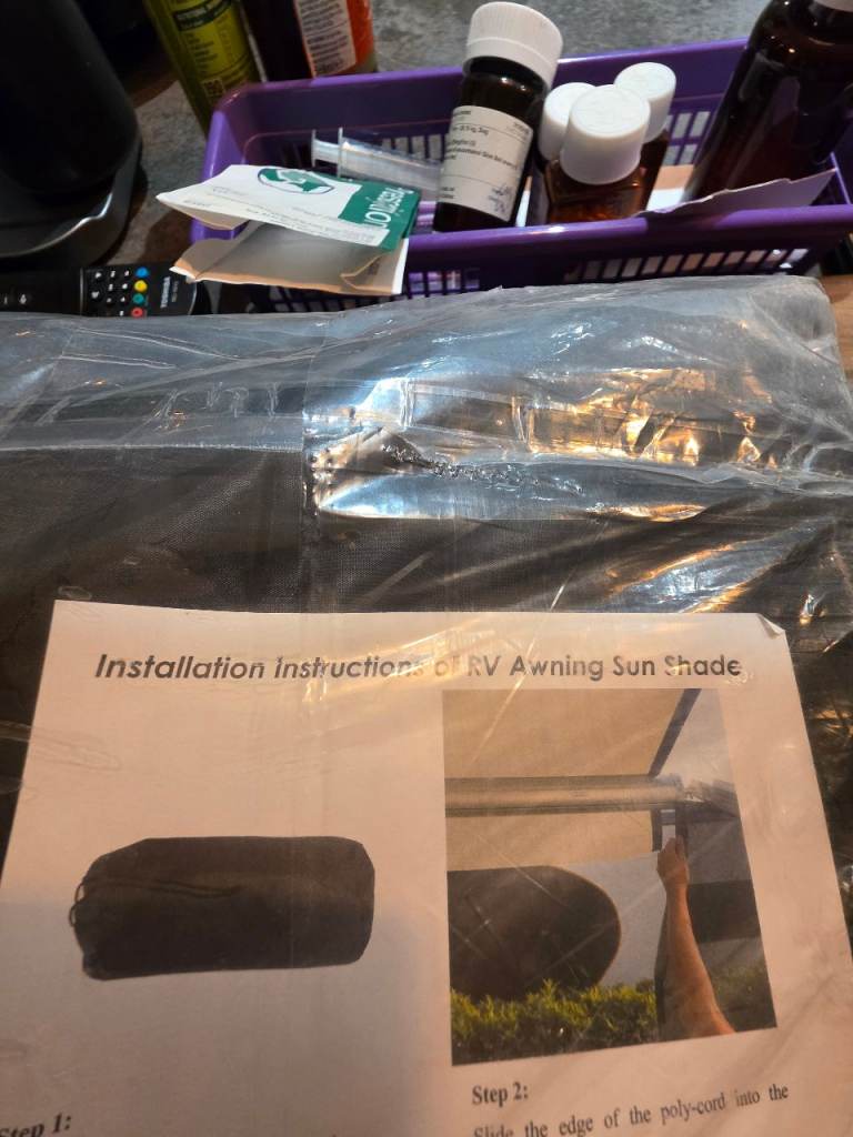 Sunshade for motorhome  roll out canopy 