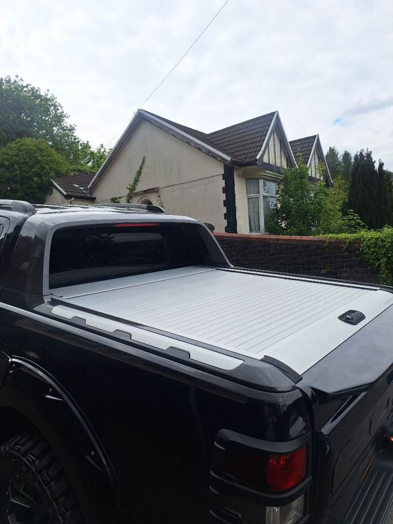 Mountain roll top canopy and sail