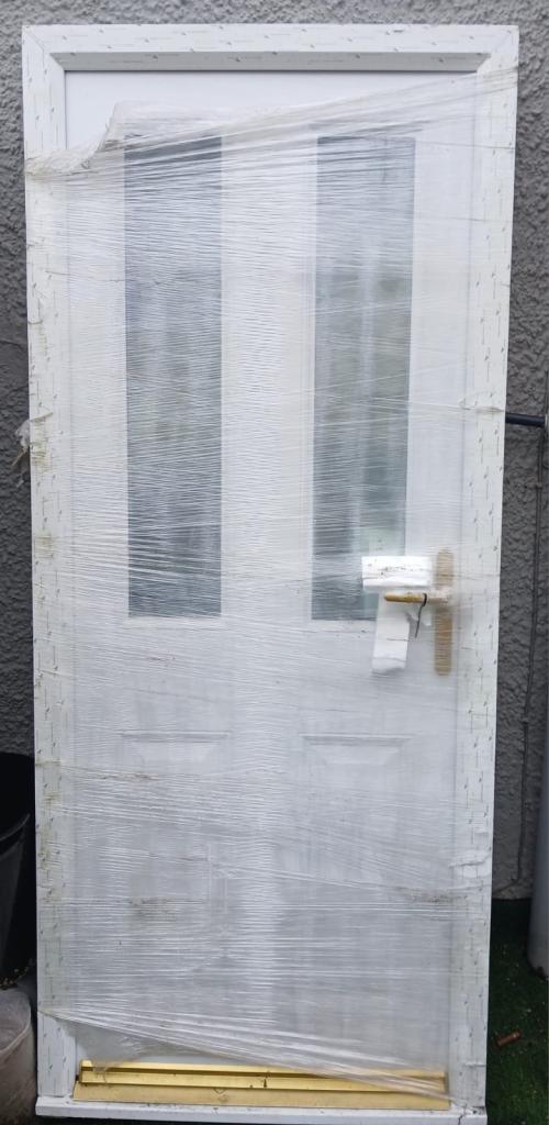 Brand New White UPVC Door with Glass Panels