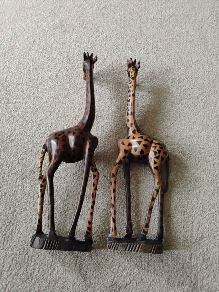 Pair of wooden carved giraffes
