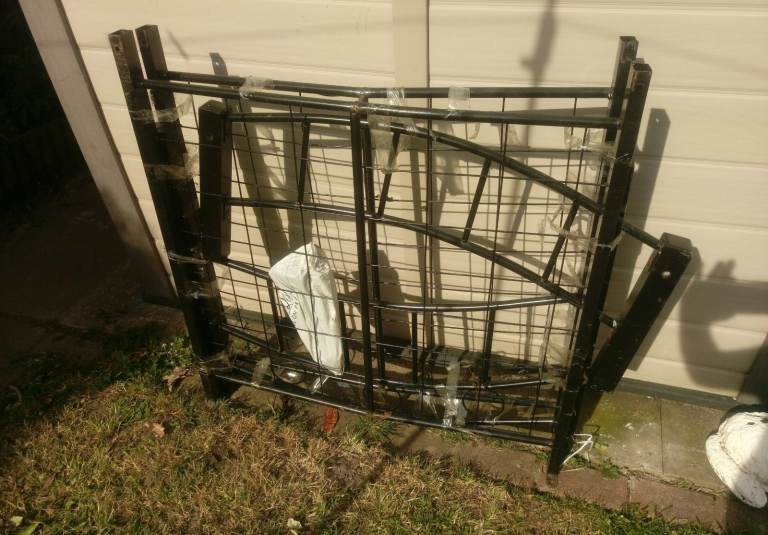 black wrought iron double gates £35.  /each gate 4ft wide