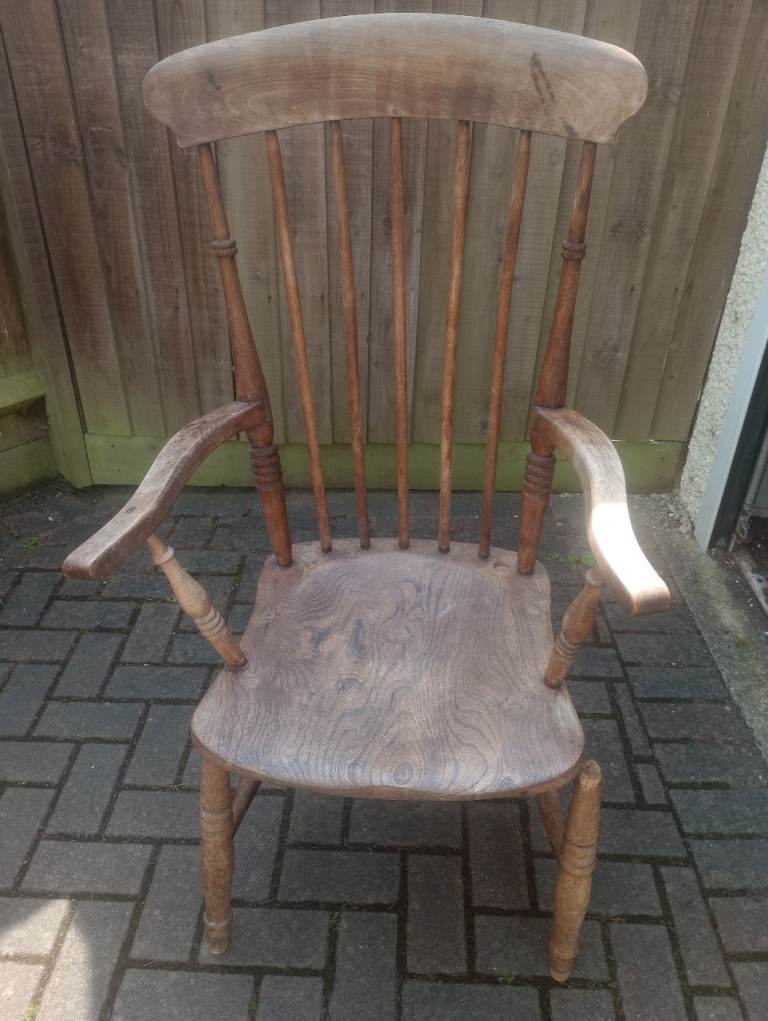 Wooden chair with broken leg