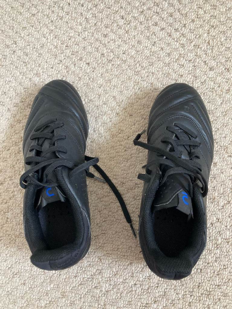 2 pairs of Decathlon kids football shoes - black leather - size junior 1 & 2.5
