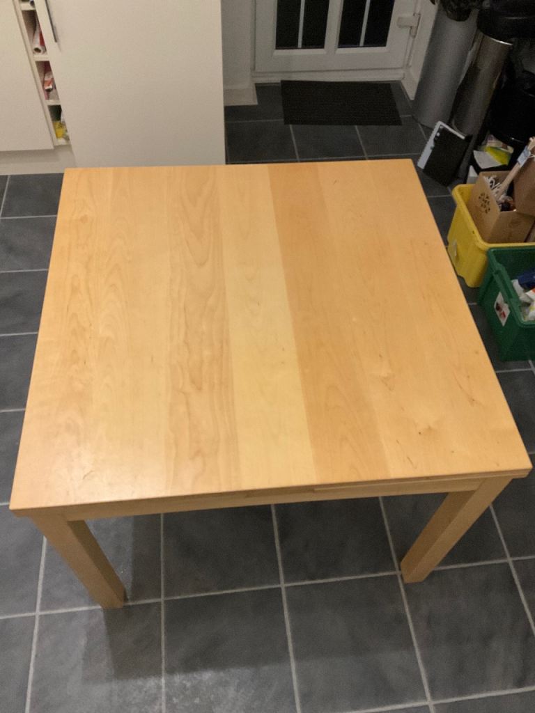 Extendable Dining Room table in beige ( used) 