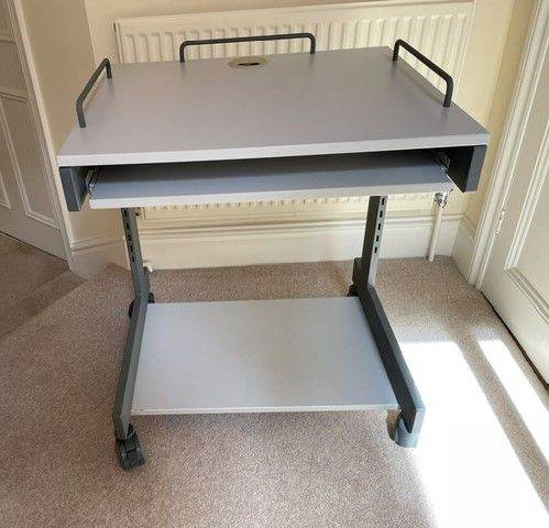 Grey Computer Desk with Keyboard Tray and Wheels – Good Condition