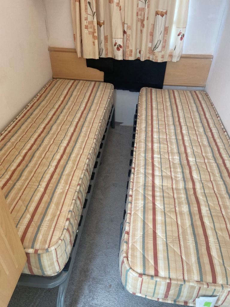 Static caravan single beds.