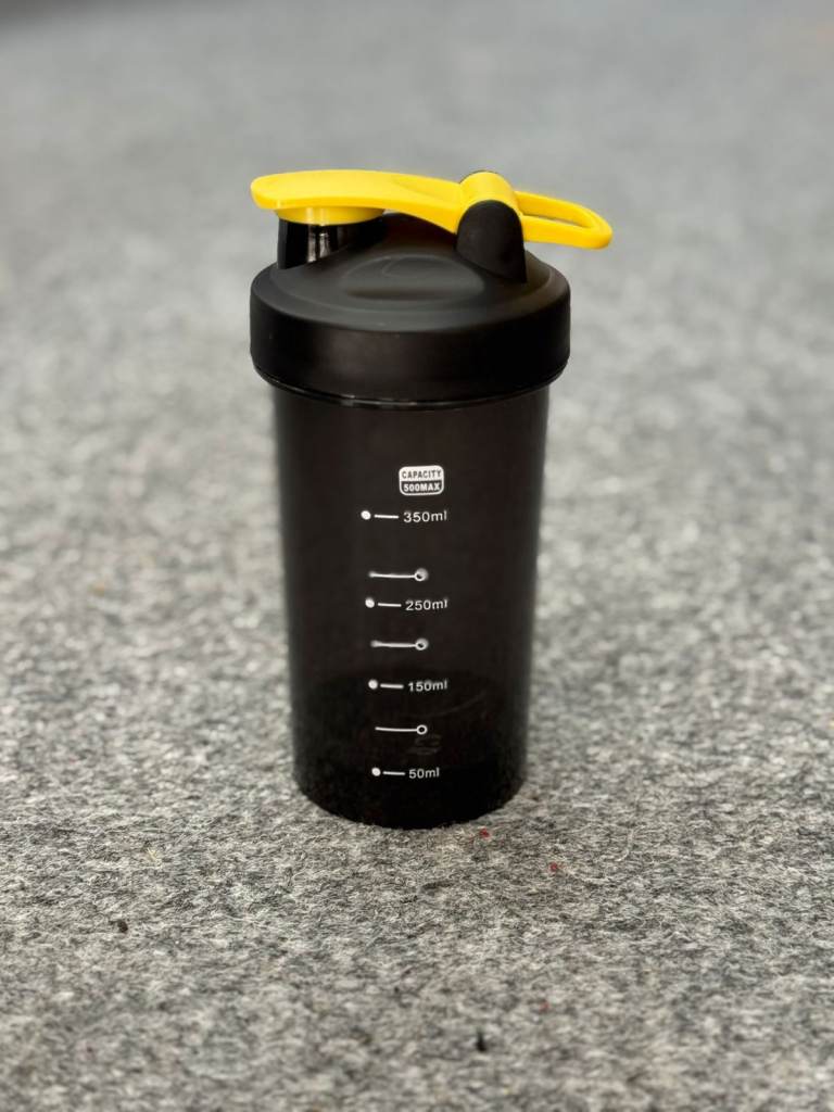 Black Plastic Storage Canister with Yellow Lid – Multi‑Purpose Container