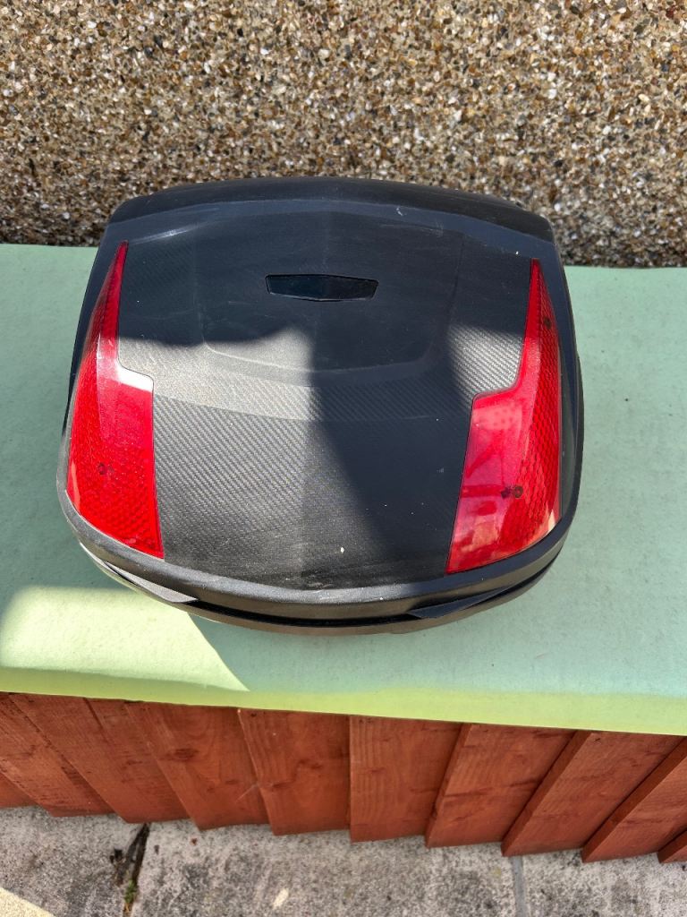 Motor cycle top box with bracket and key 