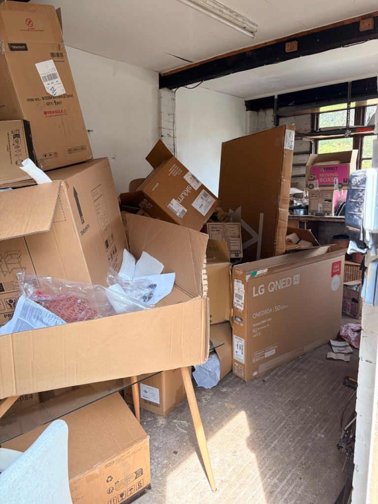 Large Cardboard Boxes flattening  - helper wanted paid 